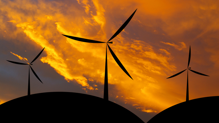 Wind turbine silhouette sunset or sunrise economic system background